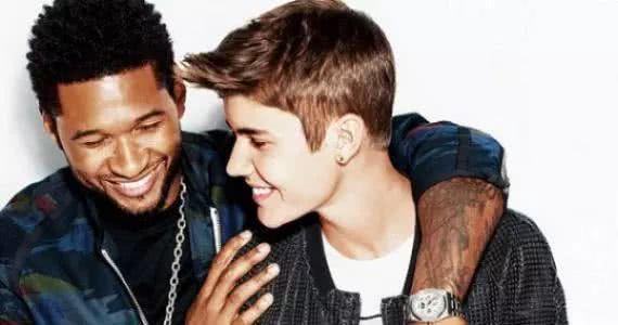 美国著名的r&b歌手亚瑟小子(usher)在网站上看到了比伯的翻唱视频,他